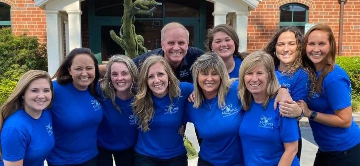 Smiling David McInnis Orthodontics team members together
